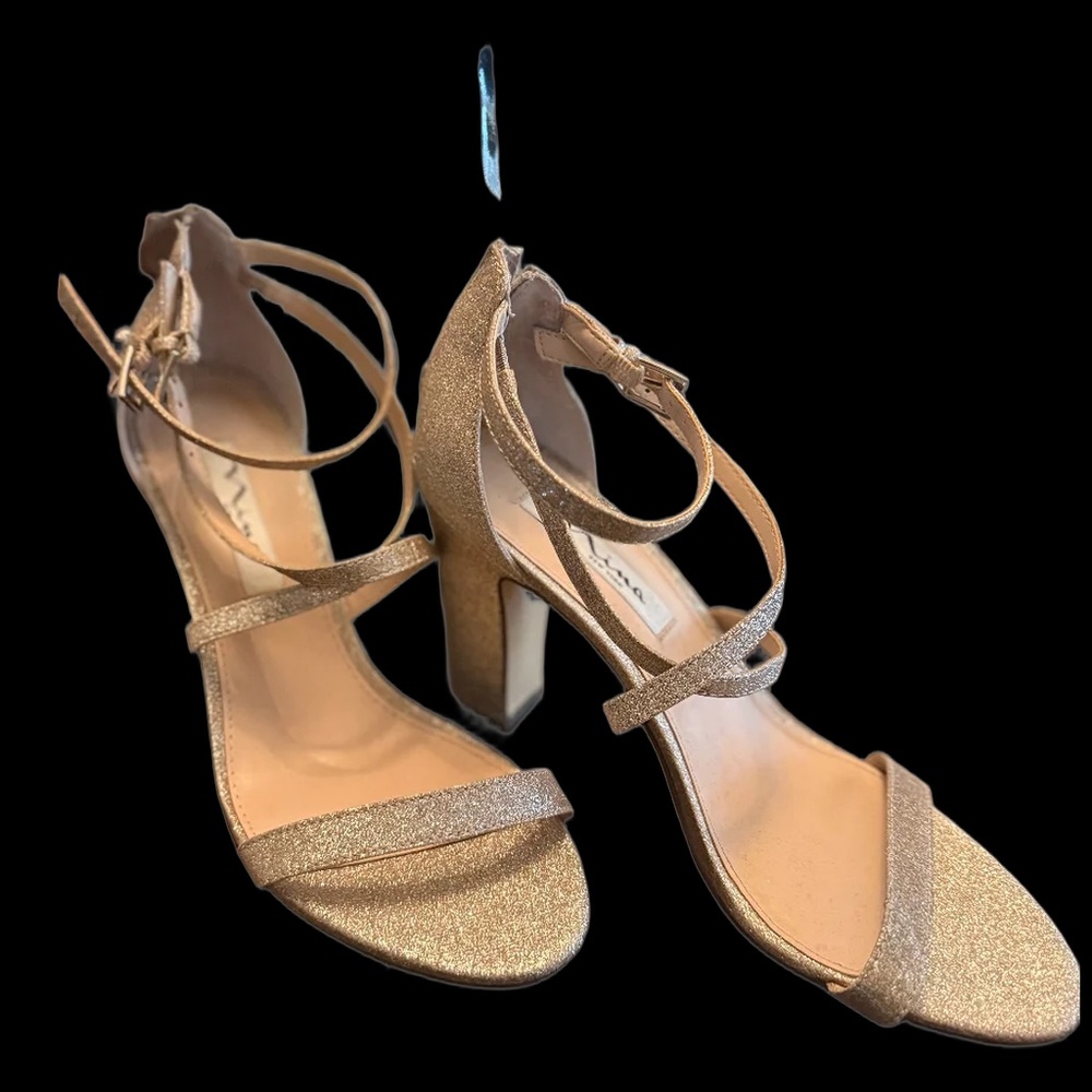 Gold glittery heel with ankle straps and zipper